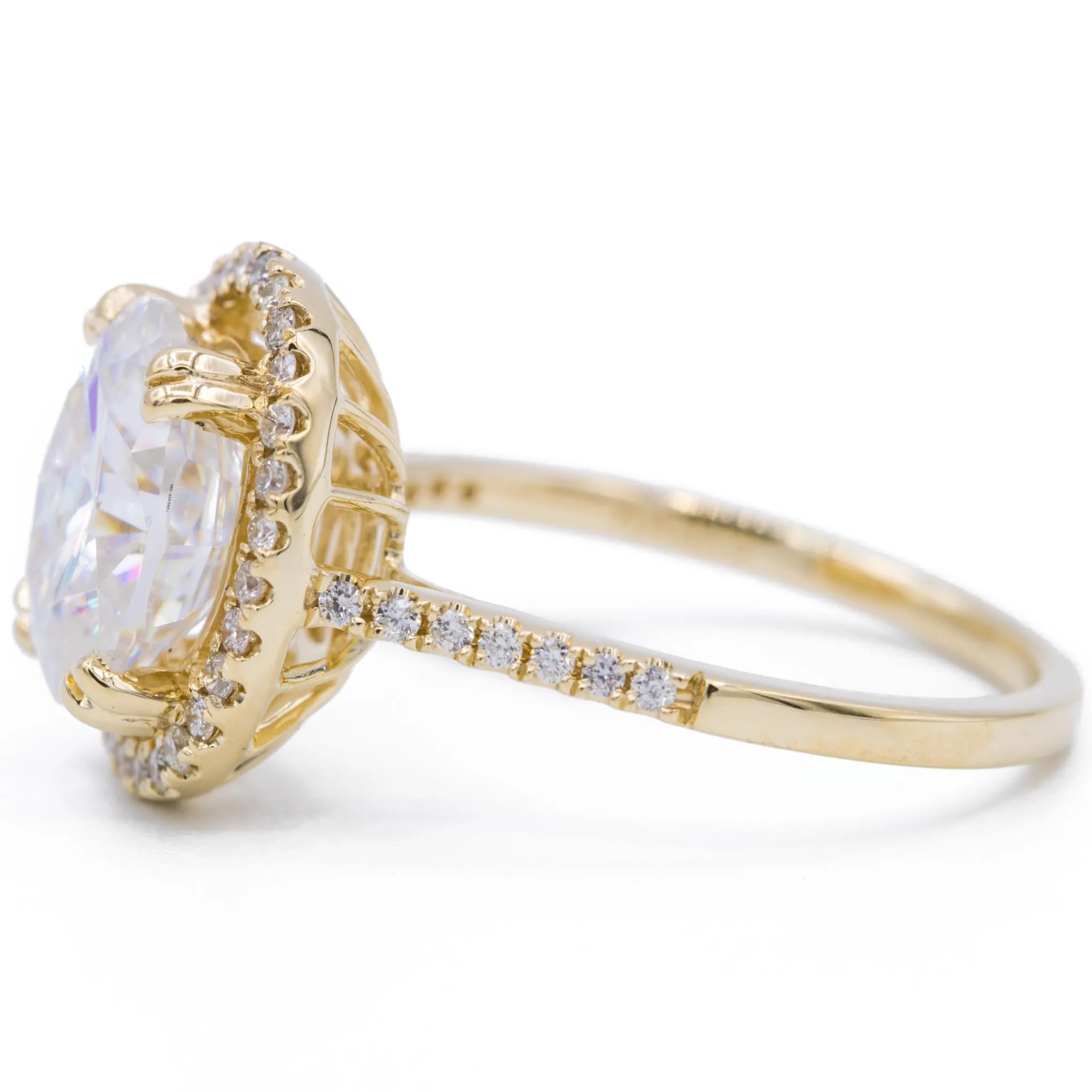 9x7mm Oval Moissanite 14K Yellow Gold Halo with Royal Basket Diamond Ring